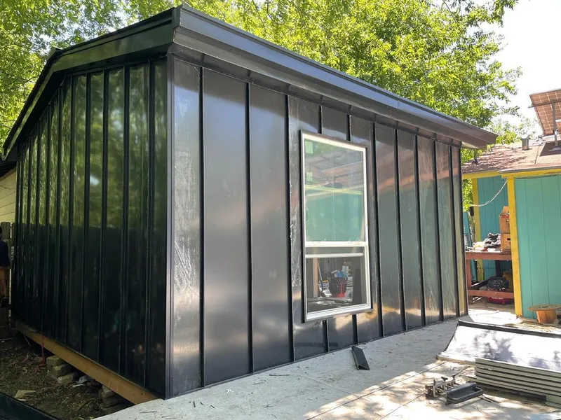 Black standing seam metal wall panels for Roof Inspection in Fort Smith