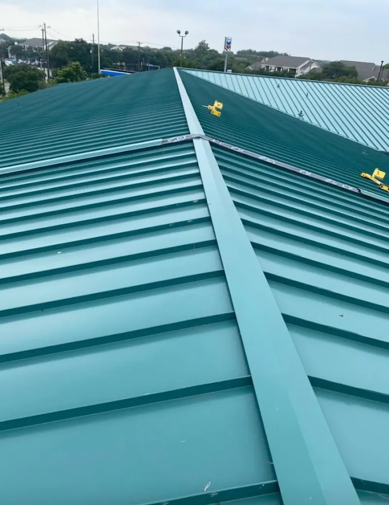 Green commercial metal roof ridge and valley for Metal Roof Repair in Fort Smith