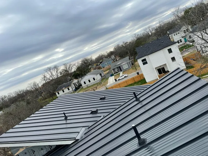 Standing seam metal roof panels with vents for Skylight Repair in Fort Smith
